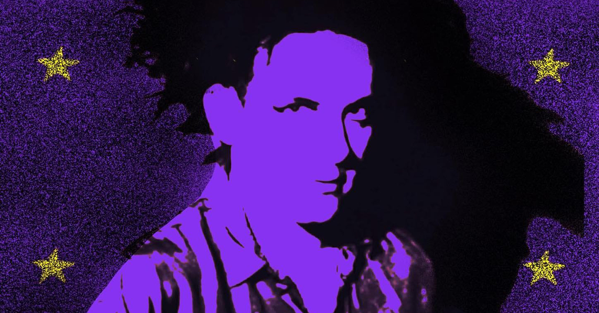 Robert Smith of the Cure on a blue poster with yellow stars around him.