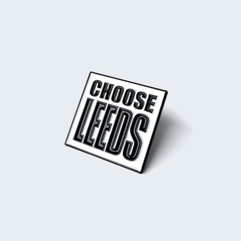 Choose Leeds enamel pin badge with black lettering on a white background.