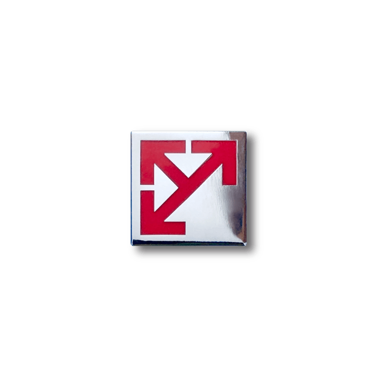 Leeds Motorway City badge with the arrow emblem in red on a polished silver background.