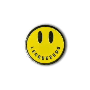 Acid House smiley badge with the word LEEEEEEEEEDS as its mouth.