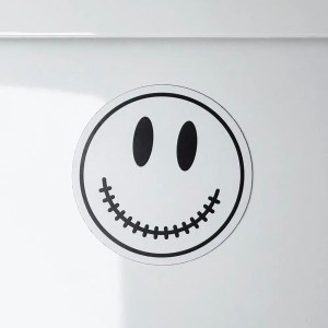 White Acid House smiley magnet.