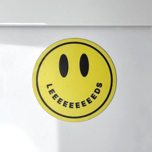Acid House smiley magnet with the word LEEEEEEEEEDS as its mouth.