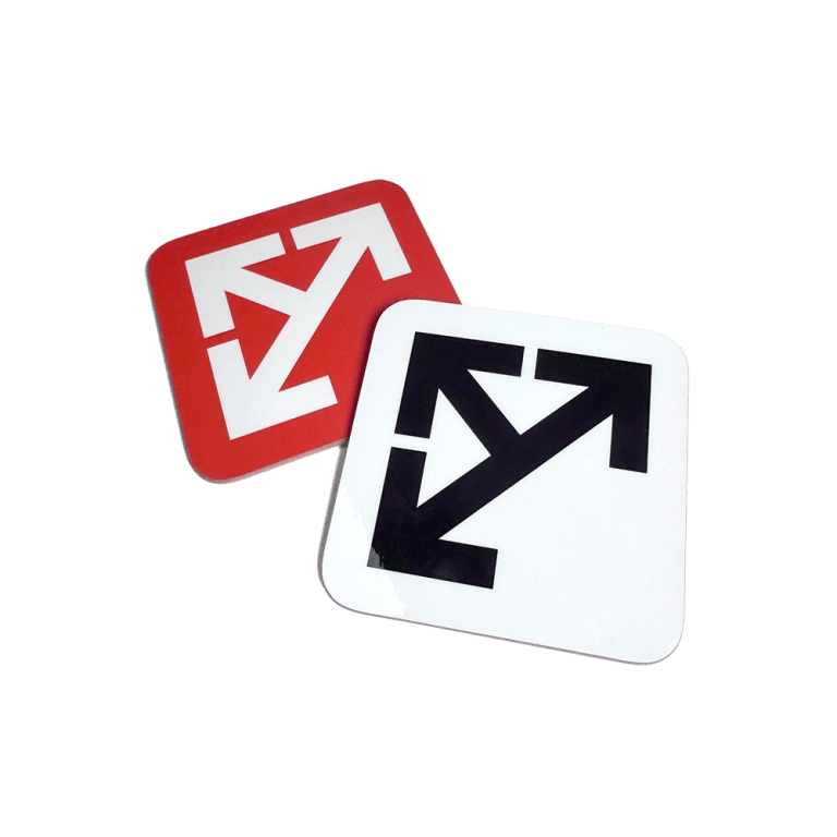 Two Leeds Motorway City of the Seventies coasters in red and white and white and black.